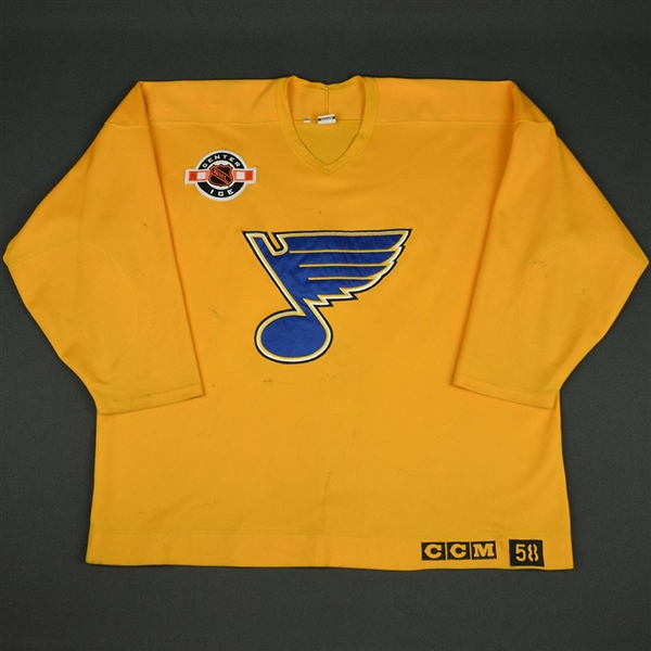CCM<br>Gold - Practice Jersey w/ Center Ice Patch - CLEARANCE<br>St. Louis Blues <br>#84 Size: 58