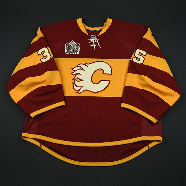 Karlsson, Henrik  *<br>Heritage Classic (Period 2 - Backup Only)<br>Calgary Flames 2010-11<br>#35 Size: 58+G