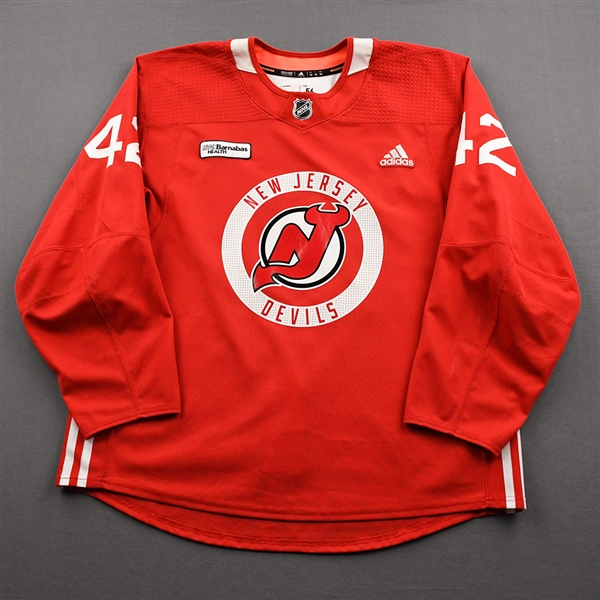 Bastian, Nathan<br>Red Practice Jersey w/ RWJ Barnabas Health Patch<br>New Jersey Devils <br>#42 Size: 56