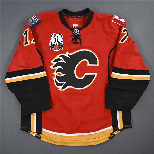 Bourque, Rene *<br>Red Set 2 w/ 30th Anniversary Patch<br>Calgary Flames 2009-10<br>#17 Size: 56