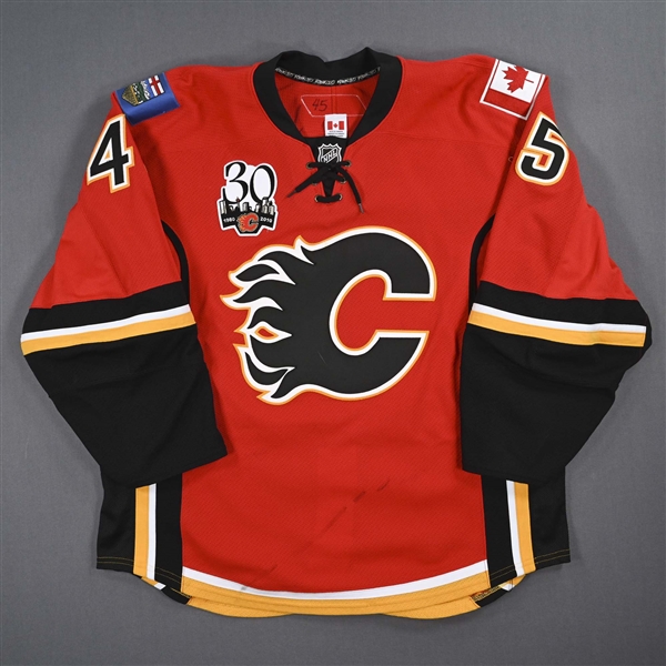 Lundmark, Jamie *<br>Red Set 1 w/ 30th Anniversary Patch<br>Calgary Flames 2009-10<br>#45 Size: 56