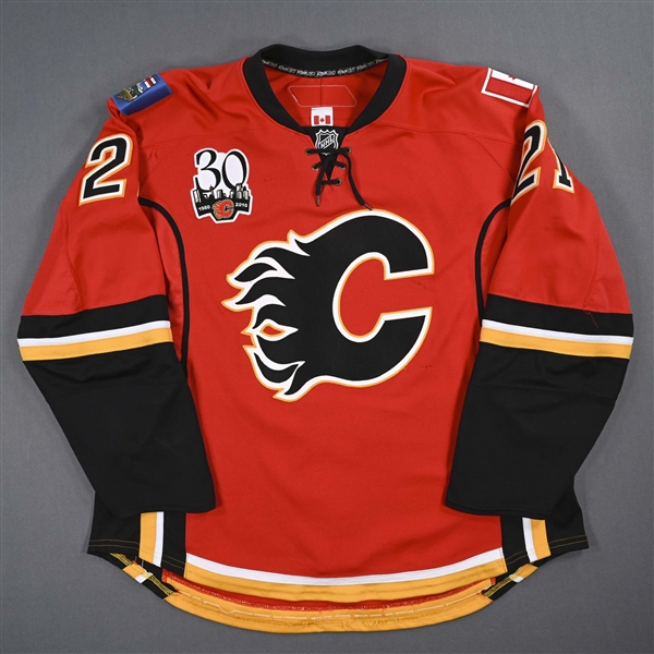 Higgins, Chris *<br>Red Set 2 w/ 30th Anniversary Patch<br>Calgary Flames 2009-10<br>#21Size: 58