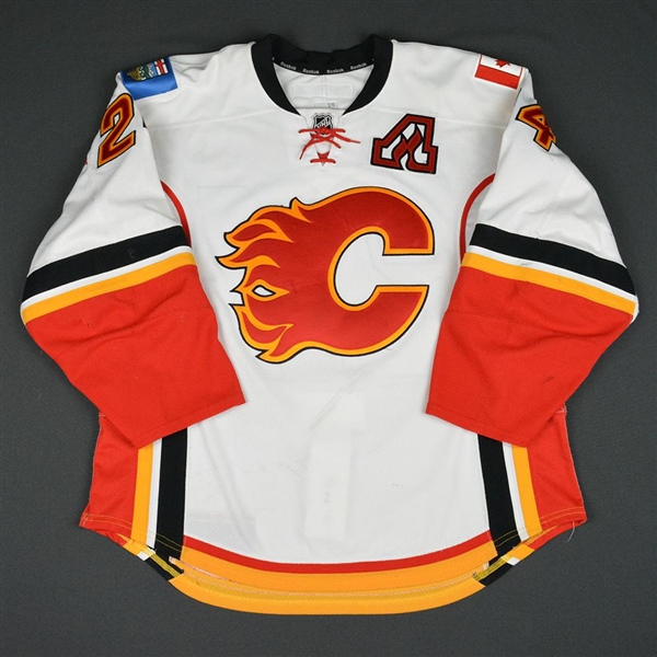 Hudler, Jiri * <br>White  Set 2 w/A  - Photo-Matched - Lady Byng Memorial Trophy Winner<br>Calgary Flames 2014-15<br>#24 Size: 54