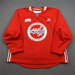 Burakovsky, Andre<br>Red Practice Jersey w/ MedStar Health Patch - CLEARANCE<br>Washington Capitals <br>#65 Size: 58