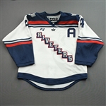 Janiga, Emily<br>White Set 1 w/A<br>Metropolitan Riveters 2021-22<br>#4 Size: MD