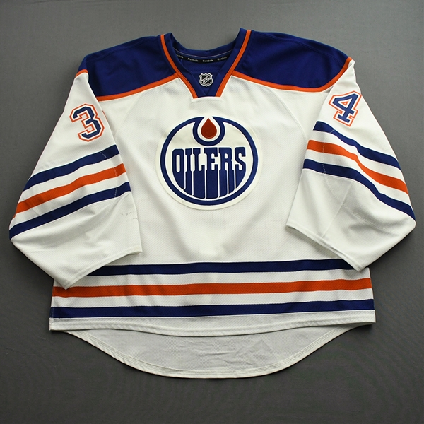 Bunz, Tyler *<br>White Set 3 - NHL Debut April 2, 2015, at Los Angeles <br>Edmonton Oilers 2014-15<br>#34 Size: 58G