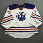 Bunz, Tyler *<br>White Set 3 - NHL Debut April 2, 2015, at Los Angeles <br>Edmonton Oilers 2014-15<br>#34 Size: 58G