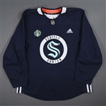 Bjorkstrand, Oliver<br>Navy Practice Jersey w/ Starbucks Patch <br>Seattle Kraken 2022-23<br>#22 Size: 56