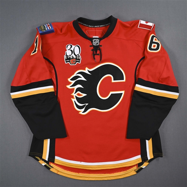 Boyd, Dustin *<br>Red Set 2 w/ 30th Anniversary Patch<br>Calgary Flames 2009-10<br>#16 Size: 56