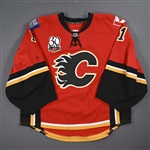 McElhinney, Curtis *<br>Red Set 2 w/ 30th Anniversary Patch<br>Calgary Flames 2009-10<br>#1 Size: 58G