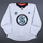 Beniers, Matty<br>White Practice Jersey w/ Starbucks Patch<br>Seattle Kraken 2023-24<br>#10 Size: 56
