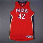 Ajinca, Alexis *<br>Kia NBA Tip-Off 14 - Red Alternate - Worn 10/28/2014<br>New Orleans Pelicans 2014-15<br>#42 Size: 3XL+4