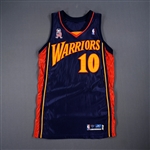 Blaylock, Mookie<br>Navy w/ 9/11 Memorial Ribbon - Worn 4 Games - 11/28/01, 12/3/01, 1/5/02 & 1/6/02 <br>Golden State Warriors 2001-02<br>#10 Size: 44
